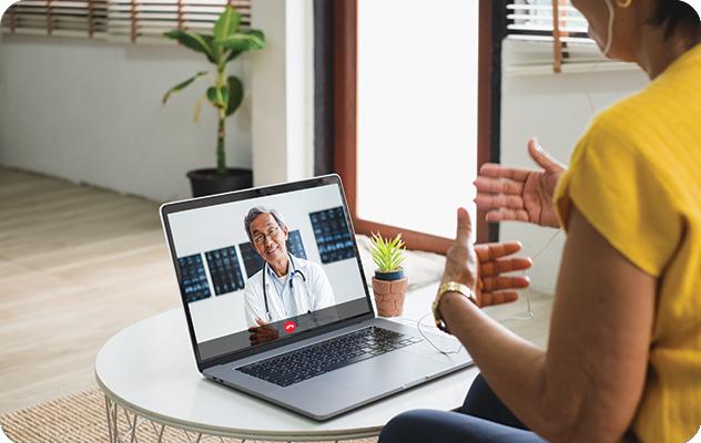 A picture of a woman using telemedicine services.