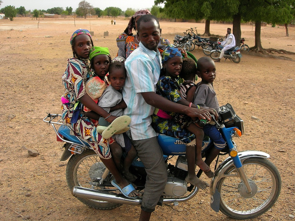 Nigerian family on motorbike