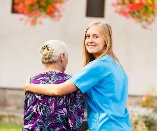 Nurse walking with a patient