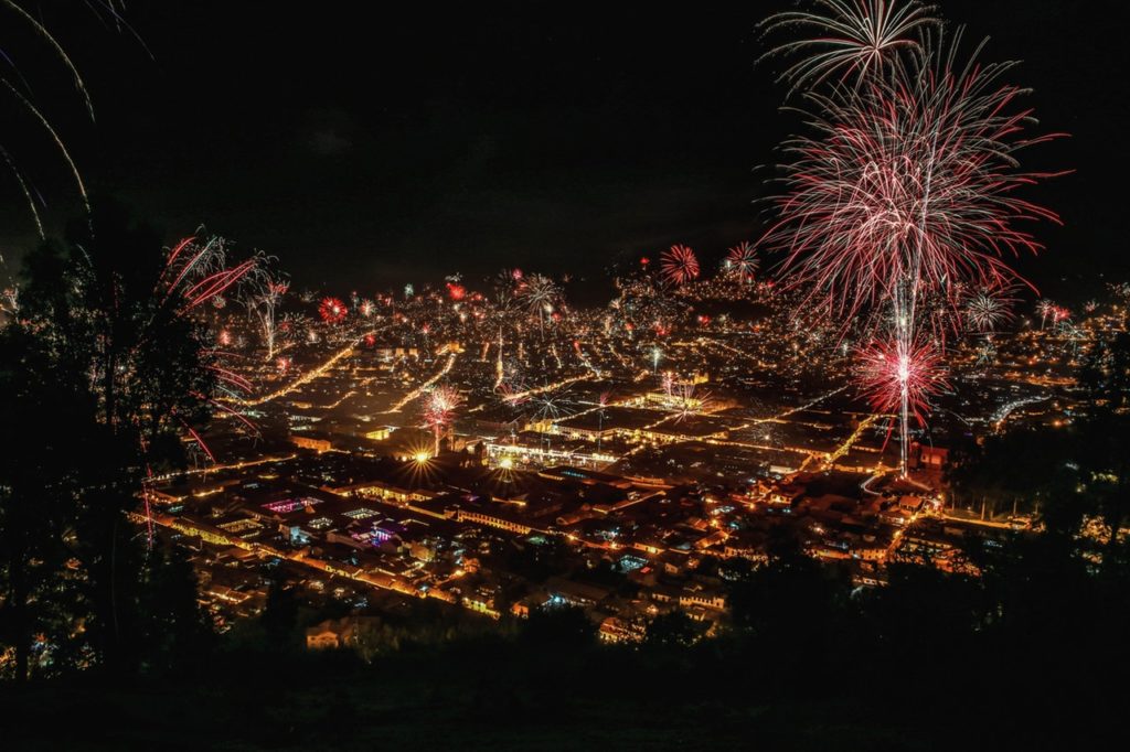 Fireworks over a city at night