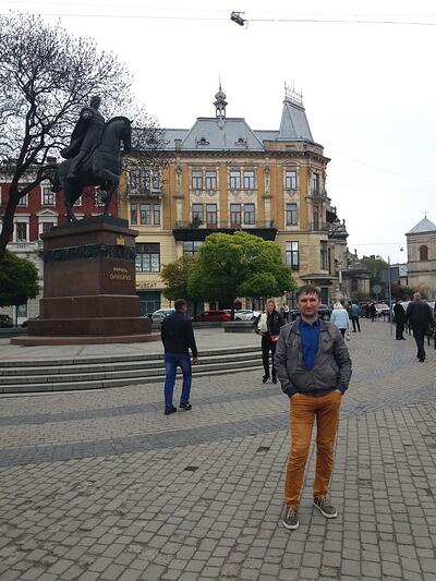 Ukranian Translator, Danylo in front of monument of King Danylo Halytsky who founded Lviv City in 1256