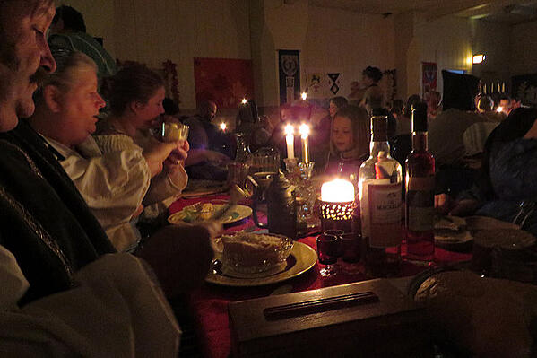 Family dinner over candlelight in Estonia