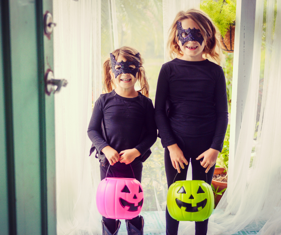 Children in costumes trick or treating